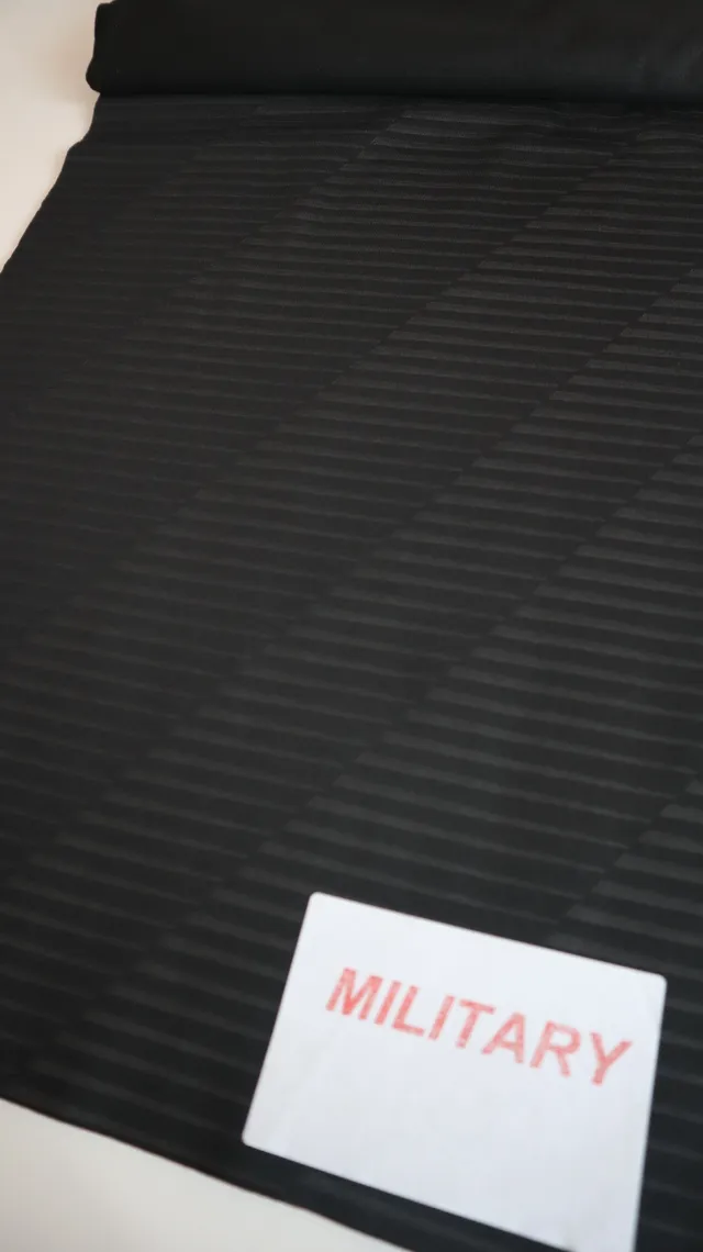 Frequency print on performance sportswear fabric, tonal pattern knitted into the surface — 10