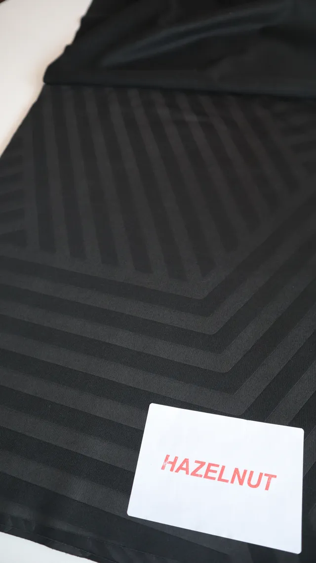 Frequency print on performance sportswear fabric, tonal pattern knitted into the surface — 3