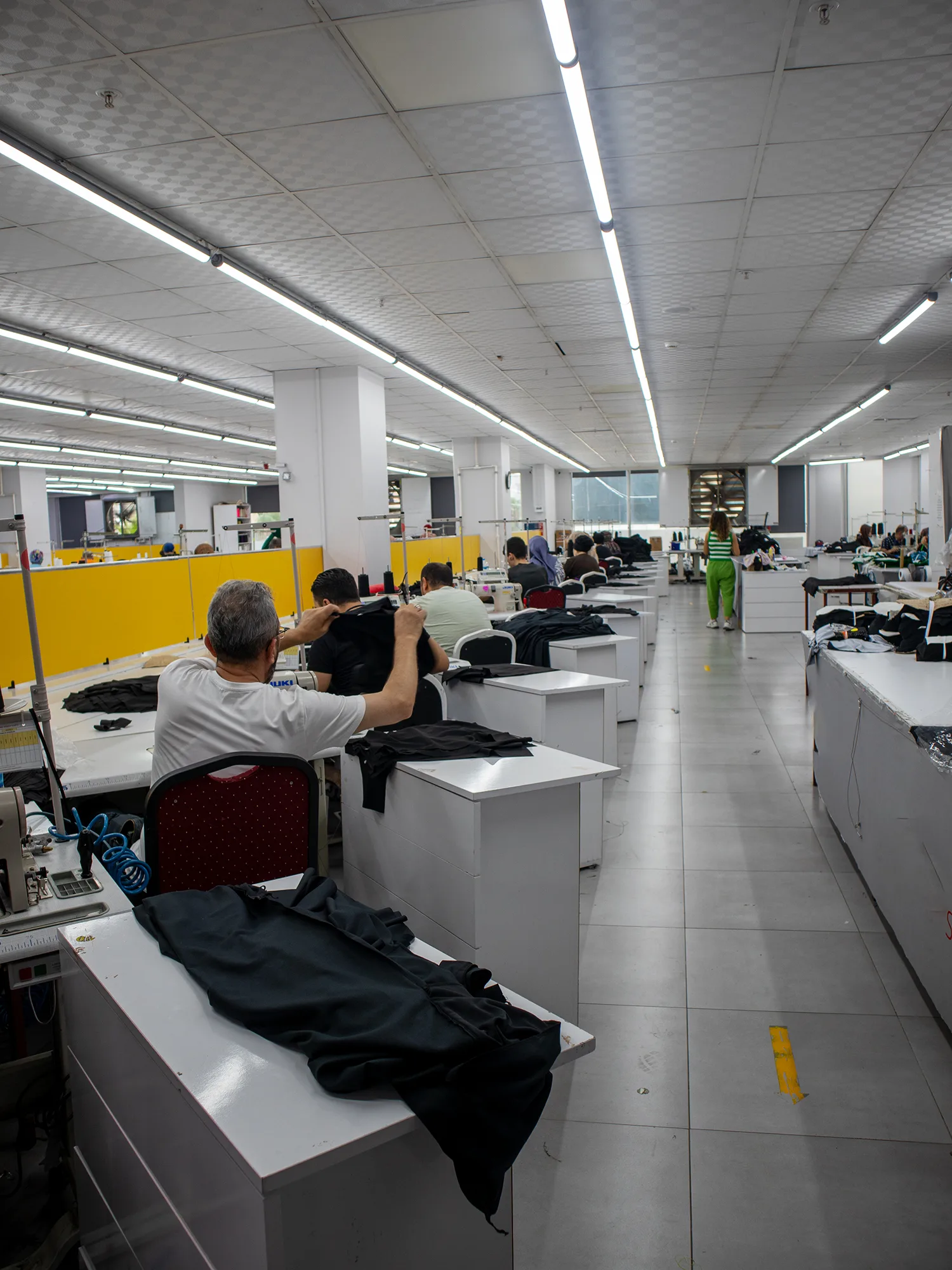 Cutting and sewing operation inside the Wolvate sportswear factory